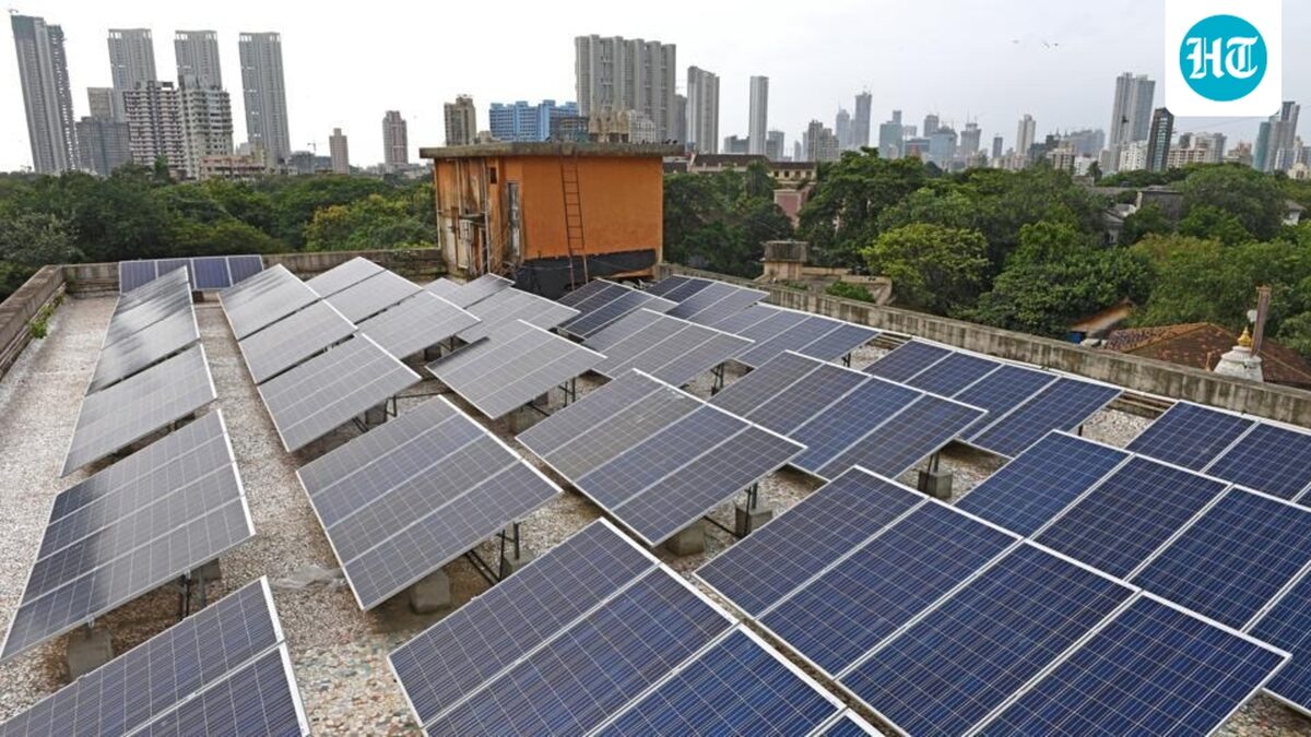 Hindustan Times article image showing rooftop solar panels against a city skyline